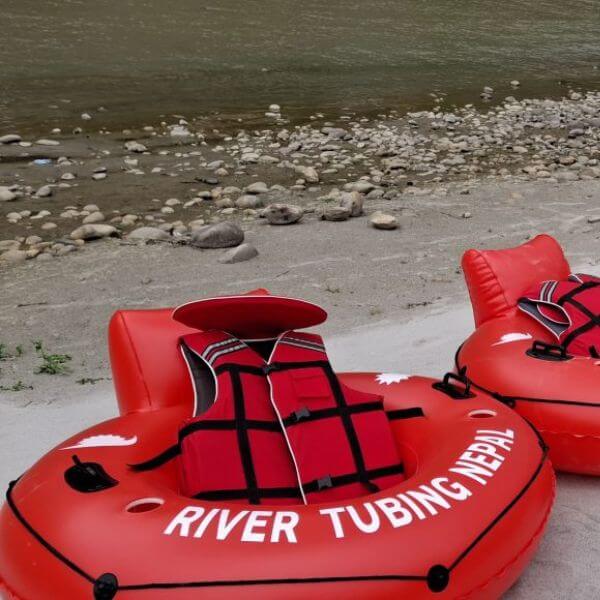 Tube in river tubing
