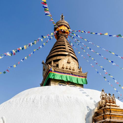 Stupa with colorful prayer flags