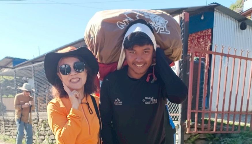 Our Porter Saroj Tamang with Guesr Along Annapurna Base Camp Trek